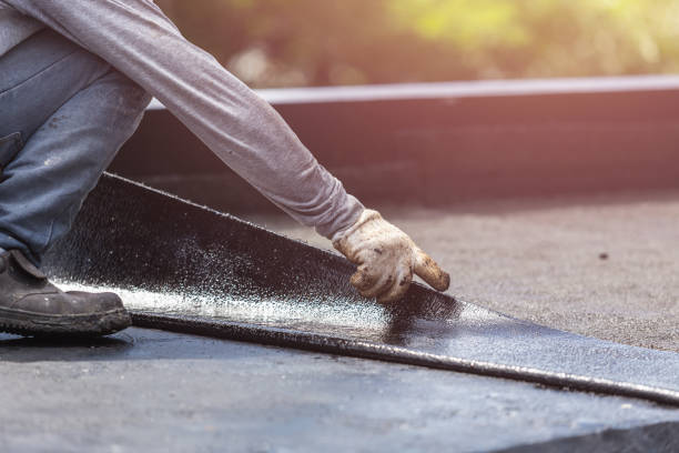 Professional Basement Waterproofing technician working in Lincoln, AL